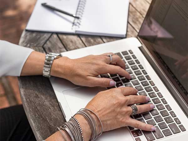 People working and planning using a laptop